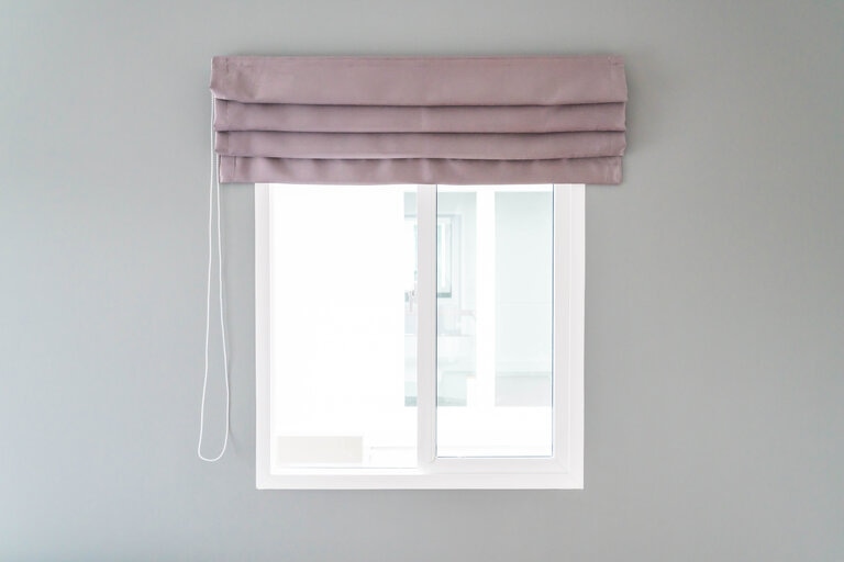 Window with pink blinds
